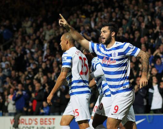 QPR s Charlie Austin celebrates scoring his sides opening goal Barclays Premier League - Queens Park Rangers Vs Aston Villa - Loftus Road - England - 27th October 2014 - Picture David Klein Sportimage EDITORIAL USE ONLY. No use with unauthorised audio, video, data, fixture lists, club league logos or live services. Online in-match use limited to 120 images, no video emulation. No use in betting, games or single club league player publications.