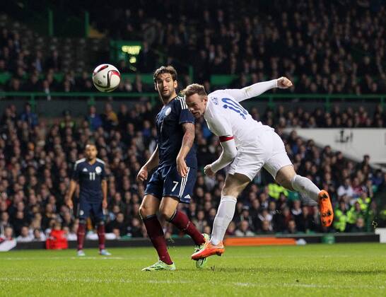 England s Wayne Rooney scoring his sides second goal - International Friendly - Scotland vs England- Celtic Park - Glasgow - Scotland - 18th November 2014 - Picture David Klein Sportimage EDITORIAL USE ONLY. No use with unauthorised audio, video, data, fixture lists, club league logos or live services. Online in-match use limited to 120 images, no video emulation. No use in betting, games or single club league player publications.