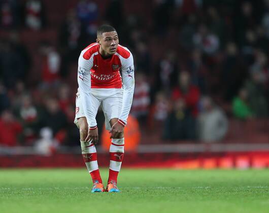 Arsenal s Kieran Gibbs looks on dejected at the final whistle Barclays Premier League- Arsenal vs Manchester United - Emirates Stadium - England - 22nd November 2014 - Picture David Klein Sportimage EDITORIAL USE ONLY. No use with unauthorised audio, video, data, fixture lists, club league logos or live services. Online in-match use limited to 120 images, no video emulation. No use in betting, games or single club league player publications.