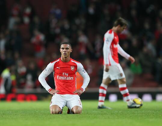 Arsenal s Kieran Gibbs looks on dejected at the final whistle Barclays Premier League- Arsenal vs Manchester United - Emirates Stadium - England - 22nd November 2014 - Picture David Klein Sportimage EDITORIAL USE ONLY. No use with unauthorised audio, video, data, fixture lists, club league logos or live services. Online in-match use limited to 120 images, no video emulation. No use in betting, games or single club league player publications.