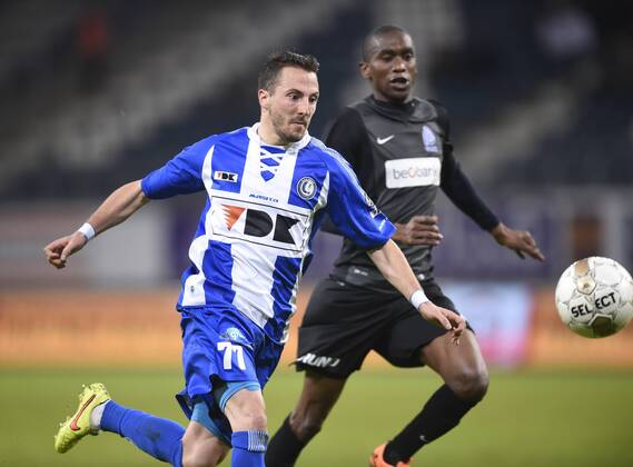 - GENT, BELGIUM: Gent s Danijel Milicevic and Genk s Ngongca Anele fight for the ball during the Jupiler Pro League match between KAA Gent and KRC Genk, in Gent, Sunday 07 December 2014, on day 18 of the Belgian soccer championship. JOHNxTHYS  x04516915x