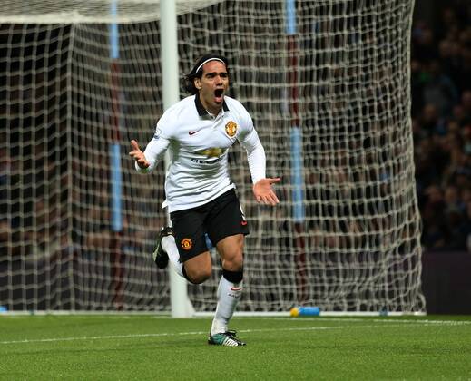Manchester United ManU s Radamel Falcao celebrates scoring his sides opening goal Barclays Premier League - Aston Villa vs Manchester United - Villa Park - England - 19th December 2014 - Picture DavidKlein Sportimage EDITORIAL USE ONLY. No use with unauthorised audio, video, data, fixture lists, club league logos or live services. Online in-match use limited to 120 images, no video emulation. No use in betting, games or single club league player publications.