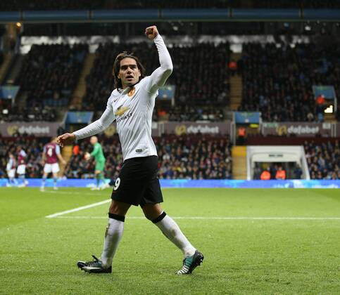Manchester United ManU s Radamel Falcao celebrates scoring his sides opening goal Barclays Premier League - Aston Villa vs Manchester United - Villa Park - England - 19th December 2014 - Picture DavidKlein Sportimage EDITORIAL USE ONLY. No use with unauthorised audio, video, data, fixture lists, club league logos or live services. Online in-match use limited to 120 images, no video emulation. No use in betting, games or single club league player publications.