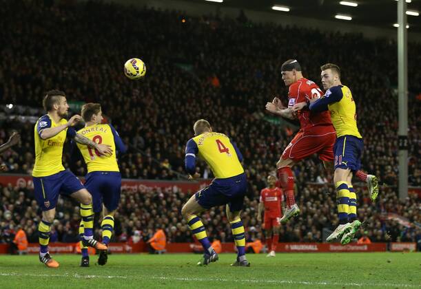 Aktuell Fußball, England, Premier League, FC Liverpool - FC Arsenal Liverpool s Martin Skrtel scoring his sides second goal Barclays Premier League - Liverpool vs Arsenal - Anfield - England - 21st December 2014 - Picture David Klein Sportimage EDITORIAL USE ONLY. No use with unauthorised audio, video, data, fixture lists, club league logos or live services. Online in-match use limited to 120 images, no video emulation. No use in betting, games or single club league player publications.