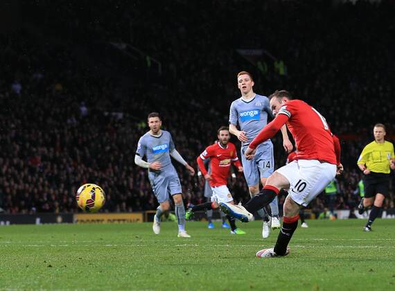 Manchester United ManU s Wayne Rooney scoring his sides second goal Barclays Premier League - Manchester United vs Newcastle United - Old Trafford - England - 26th December 2014 - Picture David Klein Sportimage EDITORIAL USE ONLY. No use with unauthorised audio, video, data, fixture lists, club league logos or live services. Online in-match use limited to 120 images, no video emulation. No use in betting, games or single club league player publications.