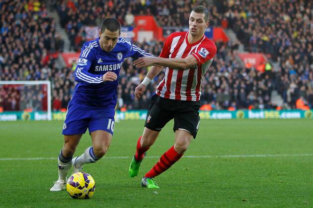 Football - 2014 2015 Premier League - Southampton vs. Chelsea Eden Hazard of Chelsea and Southampton s Morgan Schneiderlin in action at St Mary s Stadium Southampton Colorsport Shaun Boggust