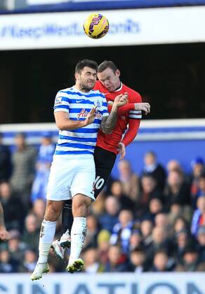 QPR s Charlie Austin tussles with Manchester United ManU s Wayne Rooney Barclays Premier League - Queens Park Rangers vs Manchester United - Loftus Road - England - 17th January 2015 - Picture David Klein Sportimage EDITORIAL USE ONLY. No use with unauthorised audio, video, data, fixture lists, club league logos or live services. Online in-match use limited to 120 images, no video emulation. No use in betting, games or single club league player publications.