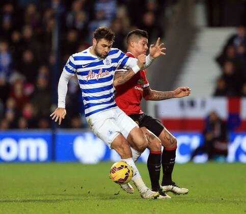 QPR s Charlie Austin tussles with Manchester United ManU s Marcos Rojo Barclays Premier League - Queens Park Rangers vs Manchester United - Loftus Road - England - 17th January 2015 - Picture David Klein Sportimage EDITORIAL USE ONLY. No use with unauthorised audio, video, data, fixture lists, club league logos or live services. Online in-match use limited to 120 images, no video emulation. No use in betting, games or single club league player publications.