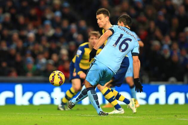 Sergio Aguero of Manchester City fails to latch on to a goal scoring opportunity - Manchester City vs. Arsenal - Barclay s Premier League - Etihad Stadium - Manchester - 18 01 2015 Pic Philip Oldham Sportimage EDITORIAL USE ONLY. No use with unauthorised audio, video, data, fixture lists, club league logos or live services. Online in-match use limited to 120 images, no video emulation. No use in betting, games or single club league player publications.