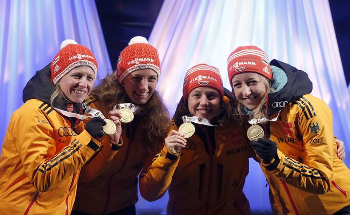 BIATHLON - IBU WC Kontiolahti 2015 KONTIOLAHTI,FINLAND,14.MAR.15 - BIATHLON - IBU World Championships, relay 4x6km, ladies, Medal Plaza, award ceremony. Image shows Franziska Hildebrand, Vanessa, Hinz, Laura Dahlmeier Franziska Preuss (GER).