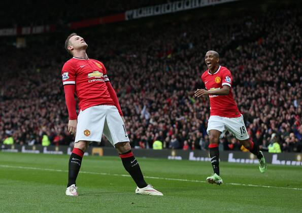 Wayne Rooney of Manchester United ManU celebrates scoring the third goal with a reference to a story that he had been knocked out in his kitchen while play boxing - Barclays Premier League - Manchester Utd vs Tottenham - Old Trafford Stadium - Manchester - England - 15th March 2015 - Picture Simon Bellis Sportimage EDITORIAL USE ONLY. No use with unauthorised audio, video, data, fixture lists, club league logos or live services. Online in-match use limited to 120 images, no video emulation. No use in betting, games or single club league player publications.