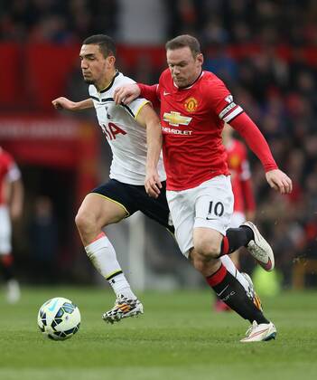 Wayne Rooney of Manchester United ManU tussles with Nabil Bentaleb of Tottenham - Barclays Premier League - Manchester Utd vs Tottenham - Old Trafford Stadium - Manchester - England - 15th March 2015 - Picture Simon Bellis Sportimage EDITORIAL USE ONLY. No use with unauthorised audio, video, data, fixture lists, club league logos or live services. Online in-match use limited to 120 images, no video emulation. No use in betting, games or single club league player publications.