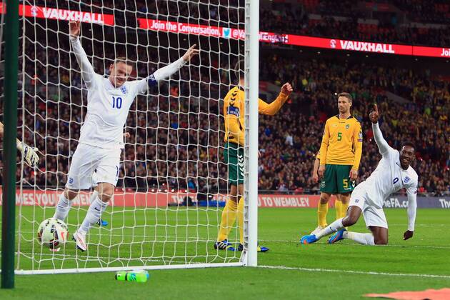 Danny Welbeck and Wayne Rooney of England celebrate the second goal - England vs. Lithuania - UEFA EURO EM Europameisterschaft Fussball 2016 Qualifier - Wembley Stadium - London - 27 03 2015 Pic Philip Oldham Sportimage EDITORIAL USE ONLY. No use with unauthorised audio, video, data, fixture lists, club league logos or live services. Online in-match use limited to 120 images, no video emulation. No use in betting, games or single club league player publications.
