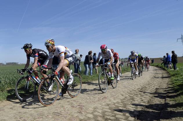 - ROUBAIX, FRANCE: German Andre Greipel of Lotto - Soudal (C) and other riders pictured in action during the Paris-Roubaix one day cycling race, 253,5 km from Compiegne to the Velodrome in Roubaix, Sunday 12 April 2015. DIRKxWAEM  x04602995x