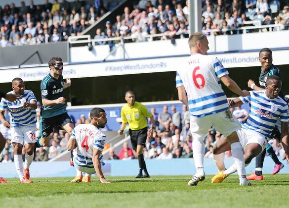 Chelsea s Cesc Fabregas scoring his sides opening goal Barclays Premier League- Queens Park Rangers vs Chelsea - Loftus Road - England - 12h April 2015 - Picture David Klein Sportimage EDITORIAL USE ONLY. No use with unauthorised audio, video, data, fixture lists, club league logos or live services. Online in-match use limited to 120 images, no video emulation. No use in betting, games or single club league player publications.