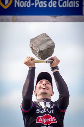 - ROUBAIX, FRANCE: German John Degenkolb of Team Giant-Alpecin celebrates on the podium after the Paris-Roubaix one day cycling race, 253,5 km from Compiegne to the Velodrome in Roubaix, Sunday 12 April 2015. LUCxCLAESSEN  x04603271x