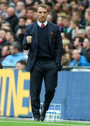 Football - 2014 2015 - FA Cup Semi Final, - Aston Villa Vs Liverpool, Liverpool s Manager Brendan Rodgers with a clenched fist in celebration at Wembley Stadium COLORSPORT DANIEL BEARHAM  AST_LIV