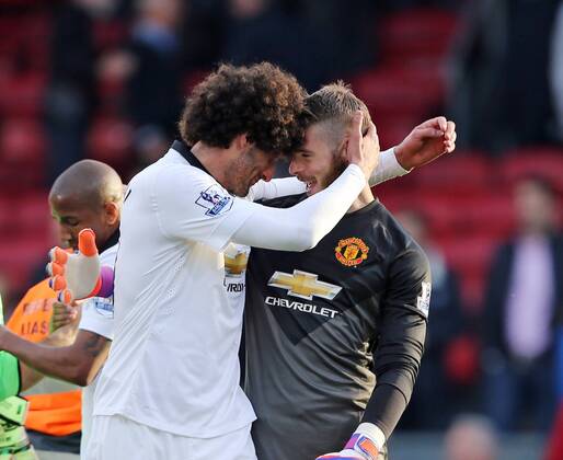 Manchester United ManU s Marouane Fellaini celebrates at the final whistle with David De Gea Barclays Premier League - Crystal Palace vs Manchester United- Selhurst Park - England - 9th May 2015 - Picture David Klein Sportimage EDITORIAL USE ONLY. No use with unauthorised audio, video, data, fixture lists, club league logos or live services. Online in-match use limited to 120 images, no video emulation. No use in betting, games or single club league player publications.