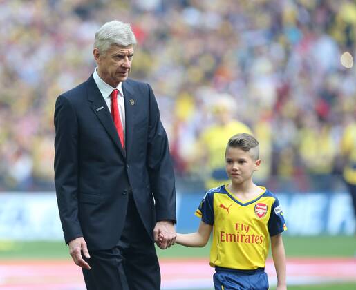 Arsenal s manager Arsene Wenger walks out with a mascot FA Cup Final - Arsenal vs Aston Villa - Wembley Stadium - England - 30th May 2015 - Picture David Klein Sportimage EDITORIAL USE ONLY. No use with unauthorised audio, video, data, fixture lists, club league logos or live services. Online in-match use limited to 120 images, no video emulation. No use in betting, games or single club league player publications.