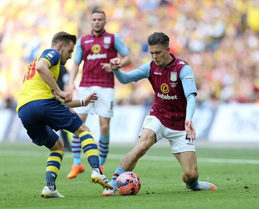 Arsenal s Aaron Ramsey tussles with Aston Villa s Jack Grealish FA Cup Final - Arsenal vs Aston Villa - Wembley Stadium - England - 30th May 2015 - Picture David Klein Sportimage EDITORIAL USE ONLY. No use with unauthorised audio, video, data, fixture lists, club league logos or live services. Online in-match use limited to 120 images, no video emulation. No use in betting, games or single club league player publications.