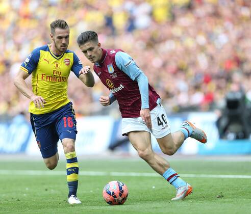 Arsenal s Aaron Ramsey tussles with Aston Villa s Jack Grealish FA Cup Final - Arsenal vs Aston Villa - Wembley Stadium - England - 30th May 2015 - Picture David Klein Sportimage EDITORIAL USE ONLY. No use with unauthorised audio, video, data, fixture lists, club league logos or live services. Online in-match use limited to 120 images, no video emulation. No use in betting, games or single club league player publications.