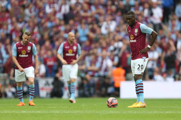 Christian Benteke of Aston Villa left dejected following Arsenal s second goal - Arsenal vs. Aston Villa - FA Cup Final - Wembley Stadium - London - 30 05 2015 Pic Philip Oldham Sportimage EDITORIAL USE ONLY. No use with unauthorised audio, video, data, fixture lists, club league logos or live services. Online in-match use limited to 120 images, no video emulation. No use in betting, games or single club league player publications.