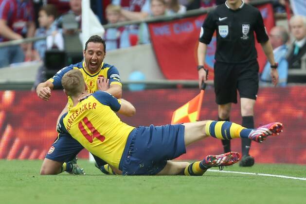 Arsenal s Per Mertesacker celebrates scoring his sides third goal - Arsenal vs. Aston Villa - FA Cup Final - Wembley Stadium - London - 30 05 2015 Pic Philip Oldham Sportimage EDITORIAL USE ONLY. No use with unauthorised audio, video, data, fixture lists, club league logos or live services. Online in-match use limited to 120 images, no video emulation. No use in betting, games or single club league player publications.