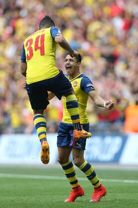 Arsenal s Alexis Sanchez celebrates scoring the second goal FA Cup Final - Arsenal vs Aston Villa - Wembley Stadium - England - 30th May 2015 - Picture David Klein Sportimage EDITORIAL USE ONLY. No use with unauthorised audio, video, data, fixture lists, club league logos or live services. Online in-match use limited to 120 images, no video emulation. No use in betting, games or single club league player publications.