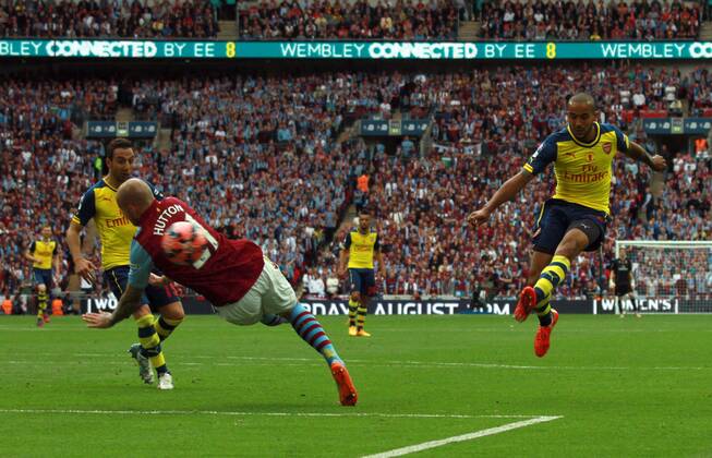 The FA Cup Final - Arsenal v Aston Villa . . London, UK . . 30.05.2015 Theo Walcott (A) scores a goal for Arsenal. 1-0