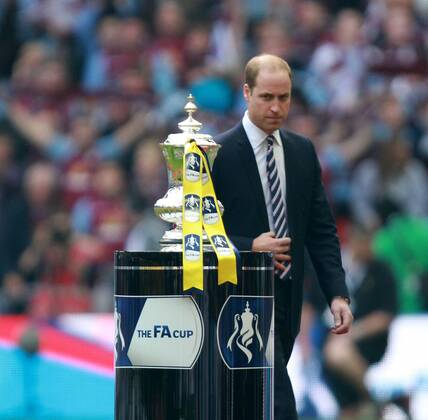 The FA Cup Final - Arsenal v Aston Villa . . London, UK . . 30.05.2015 Aston Villa fan Prince William, Duke of Cambridge, looks at The FA Cup.
