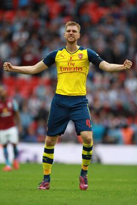 The FA Cup Final - Arsenal v Aston Villa . . London, UK . . 30.05.2015 Per Mertesacker (A) celebrates winning the FA Cup.