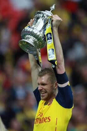 The FA Cup Final - Arsenal v Aston Villa . . London, UK . . 30.05.2015 Per Mertesacker (A) celebrates with the FA Cup.