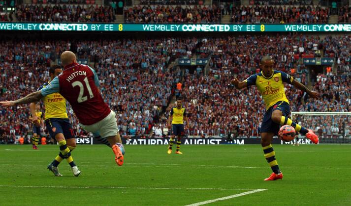 The FA Cup Final - Arsenal v Aston Villa . . London, UK . . 30.05.2015 Theo Walcott (A) scores a goal for Arsenal. 1-0