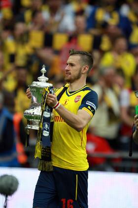 The FA Cup Final - Arsenal v Aston Villa . . London, UK . . 30.05.2015 Aaron Ramsey (A) celebrates with the FA Cup.