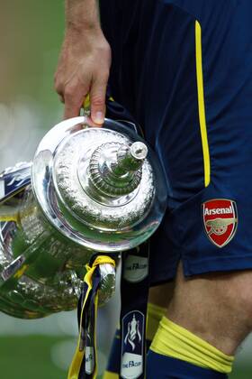 The FA Cup Final - Arsenal v Aston Villa . . London, UK . . 30.05.2015 Per Mertesacker (A) carries the trophy as Arsenal celebrate winning the FA Cup.
