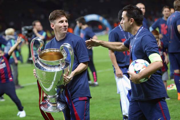 Lionel Messi and Xavi Hernandez of Barcelona - Juventus vs. Barcelona - Champion s League Final - Olympic Stadium - Berlin - Germany - 06 06 2015 Pic Philip Oldham Sportimage EDITORIAL USE ONLY. No use with unauthorised audio, video, data, fixture lists, club league logos or live services. Online in-match use limited to 120 images, no video emulation. No use in betting, games or single club league player publications.
