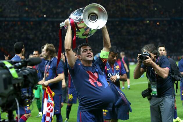 Xavi Hernandez of Barcelona with the trophy - Juventus vs. Barcelona - Champion s League Final - Olympic Stadium - Berlin - Germany - 06 06 2015 Pic Philip Oldham Sportimage EDITORIAL USE ONLY. No use with unauthorised audio, video, data, fixture lists, club league logos or live services. Online in-match use limited to 120 images, no video emulation. No use in betting, games or single club league player publications.