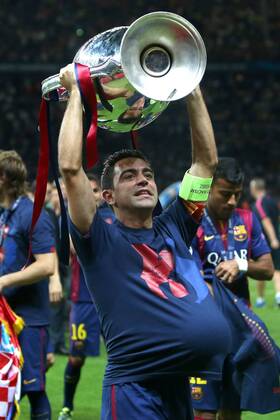 Xavi Hernandez of Barcelona with the trophy - Juventus vs. Barcelona - Champion s League Final - Olympic Stadium - Berlin - Germany - 06 06 2015 Pic Philip Oldham Sportimage EDITORIAL USE ONLY. No use with unauthorised audio, video, data, fixture lists, club league logos or live services. Online in-match use limited to 120 images, no video emulation. No use in betting, games or single club league player publications.
