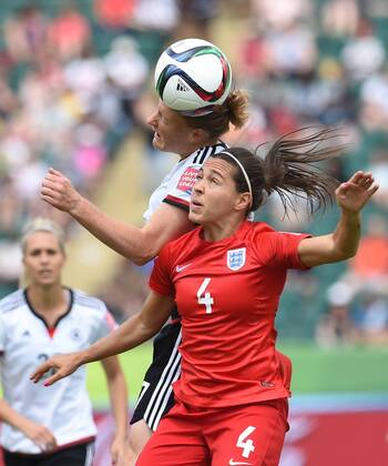 (150705) -- EDMONTON, July 5, 2015 -- Fara Williams (R) of England competes during the third place match of the FIFA 2015 Women s World Cup against Germany at Commonwealth Stadium, in Edmonton, Canada, on July 4, 2015. England defeated Germany 1-0 in extra time and won the third place of the FIFA 2015 Women s World Cup. ) (SP)CANADA-VANCOUVER-FIFA WOMEN S WORLD CUP-THIRD PLACE WangxYuguo 
