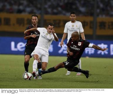 Pre-season friendly match between Real Madrid and AC Milan. In this picture, Lucas Vazquez and Nigel de Jong. xFOTOxCHEMAxREYx