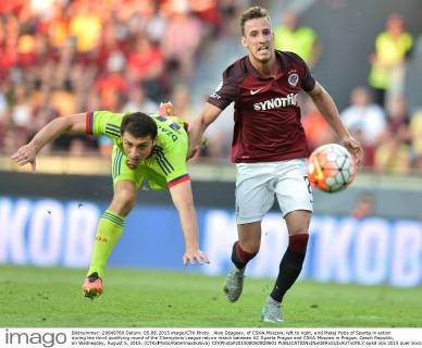 Alan Dzagoev, of CSKA Moscow, left to right, and Matej Hybs of Sparta in action during the third qualifying round of the Champions League return match between AC Sparta Prague and CSKA Moscow in Prague, Czech Republic, on Wednesday, August 5, 2015. (CTKxPhoto KaterinaxSulova) CTKPhotoP201508050808601  suk8