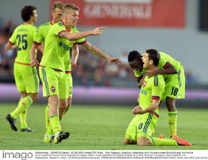 Alan Dzagoev, kneeling, celebrates with his teammates the third goal during the third qualifying round of the Champions League return match between AC Sparta Prague and CSKA Moscow in Prague, Czech Republic, on Wednesday, August 5, 2015. (CTKxPhoto KaterinaxSulova) CTKPhotoP201508050826101  suk11