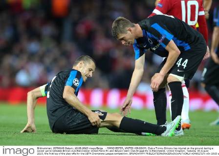 - MANCHESTER, UNITED KINGDOM: Club s Timmy Simons lies injured on the ground during a soccer game between British club Manchester United ManU FC and Belgian team Club Brugge KV in Manchester, United Kingdom, Tuesday 18 August 2015, the first leg of the play-offs for the UEFA Champions League competition. BRUNOxFAHY x04682717x