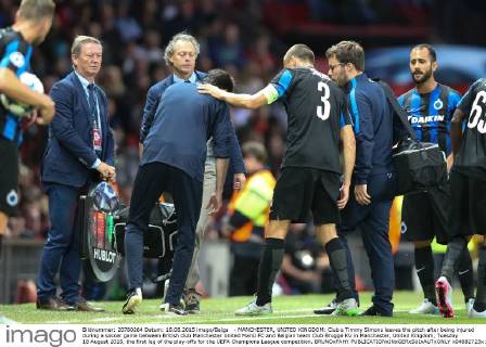 - MANCHESTER, UNITED KINGDOM: Club s Timmy Simons leaves the pitch after being injured during a soccer game between British club Manchester United ManU FC and Belgian team Club Brugge KV in Manchester, United Kingdom, Tuesday 18 August 2015, the first leg of the play-offs for the UEFA Champions League competition. BRUNOxFAHY x04682723x