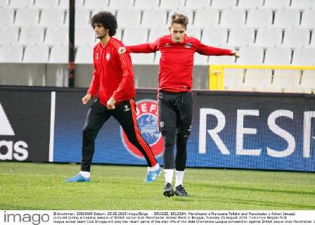 - BRUGGE, BELGIUM: Manchester s Marouane Fellaini and Manchester s Adnan Januzaj pictured during a training session of British soccer club Manchester United ManU in Brugge, Tuesday 25 August 2015. Tomorrow Belgian first league soccer team Club Brugge will play the return game of the play-offs of the Uefa Champions League competition against British soccer club Manchester United FC. Manchester United won the first leg 3-1. BRUNOxFAHY x04686994x