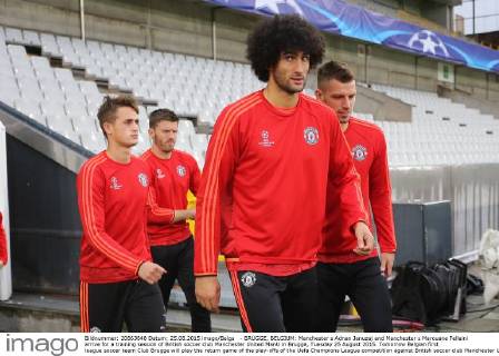 - BRUGGE, BELGIUM: Manchester s Adnan Januzaj and Manchester s Marouane Fellaini arrive for a training session of British soccer club Manchester United ManU in Brugge, Tuesday 25 August 2015. Tomorrow Belgian first league soccer team Club Brugge will play the return game of the play-offs of the Uefa Champions League competition against British soccer club Manchester United FC. Manchester United won the first leg 3-1. BRUNOxFAHY  x04687029x