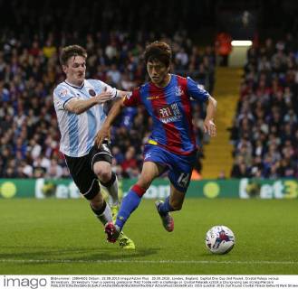 25.08.2015. London, England. Capital One Cup 2nd Round. Crystal Palace versus Shrewsbury. Shrewsbury Town s opening goalscorer Matt Tootle with a challenge on Crystal Palace& x2019;s Chung-yong Lee xCraigxMercerx  ActionPlus11653609