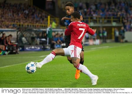 - BRUGGE, BELGIUM: Club s Jean-Charles Castelletto and Manchester s Memphis Depay fight for the ball during a soccer game between Belgian first league team Club Brugge KV and British club Manchester United ManU FC in Brugge, Wednesday 26 August 2015, the return game of the play-offs of the UEFA Champions League competition. Manchester United won the first leg 3-1. KURTxDESPLENTER x04687486x