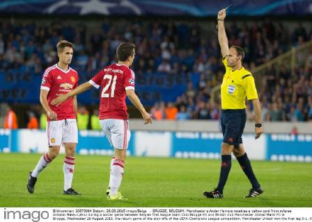 - BRUGGE, BELGIUM: Manchester s Ander Herrera receives a yellow card from referee Antonio Mateu Lahoz during a soccer game between Belgian first league team Club Brugge KV and British club Manchester United ManU FC in Brugge, Wednesday 26 August 2015, the return game of the play-offs of the UEFA Champions League competition. Manchester United won the first leg 3-1. KURTxDESPLENTER x04687522x