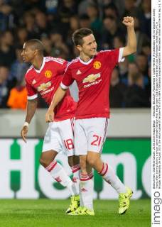 - BRUGGE, BELGIUM: Manchester s Ander Herrera (R) celebrates with his teammate Ashley Young after scoring during a soccer game between Belgian first league team Club Brugge KV and British club Manchester United ManU FC in Brugge, Wednesday 26 August 2015, the return game of the play-offs of the UEFA Champions League competition. Manchester United won the first leg 3-1. KURTxDESPLENTER  x04687657x